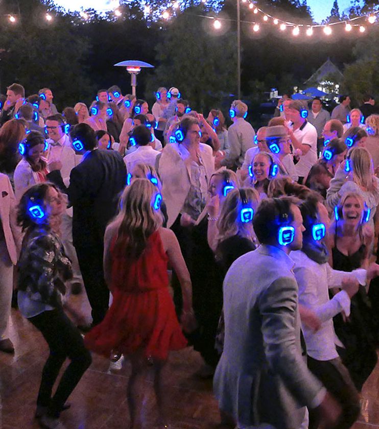 Guests singing and dancing together at a celebration